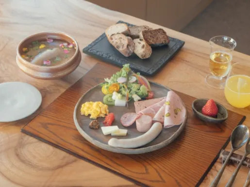 Unusual German-style Western breakfast. German bread, sausages, etc. from local stores.